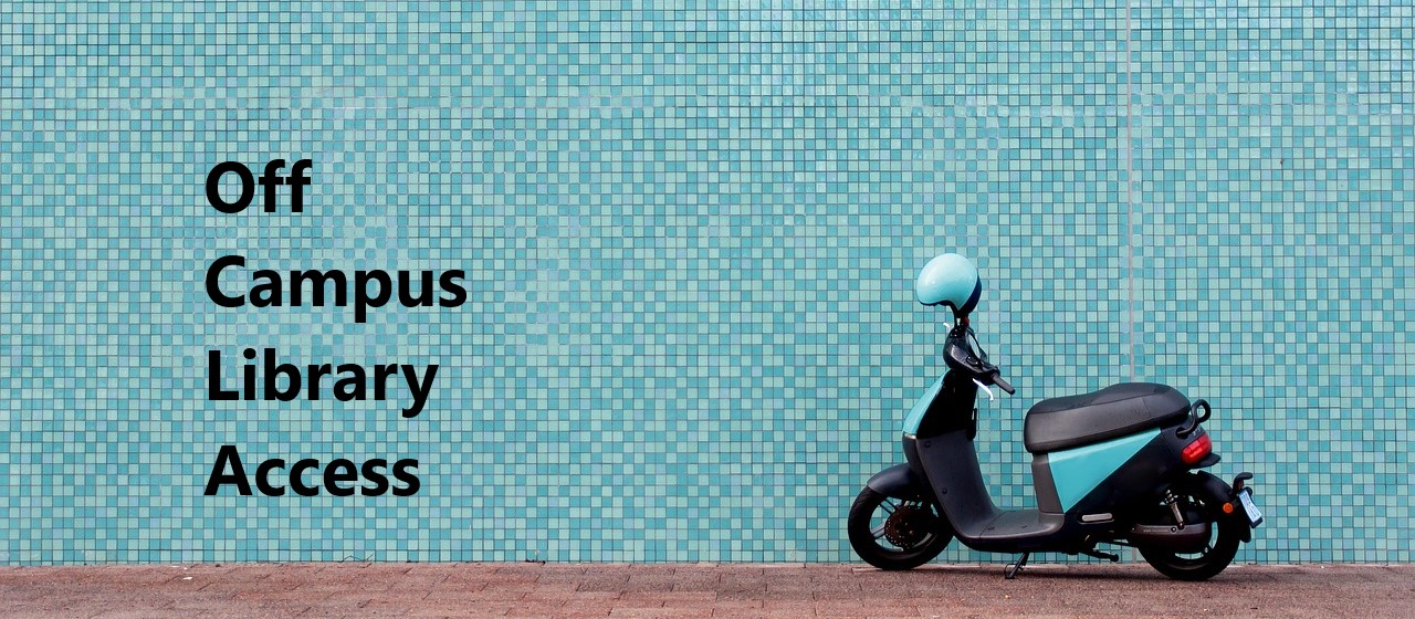 moped against a blue tile background on street